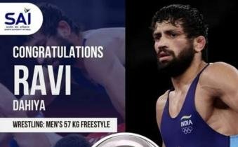 winning silver medal at Men’s Freestyle Wrestling